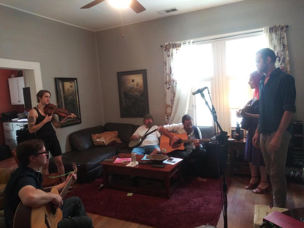 Cabbagetown musicians perform in an old home.