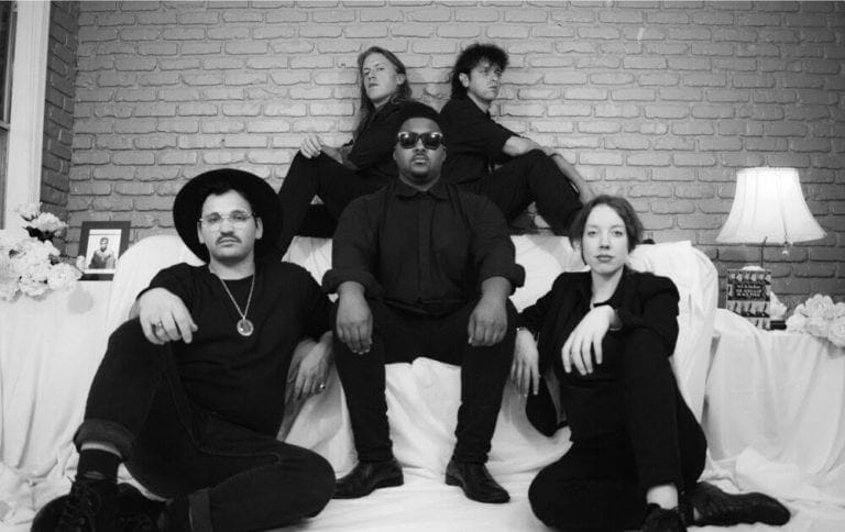 The band Shepherds pose for a group photo.