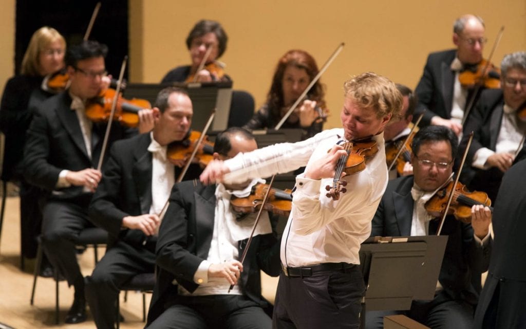 David Coucheron soloing at Symphony Hall (Photo by Jeff Roffman)