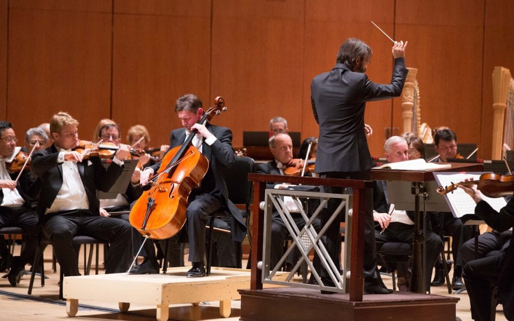 Christopher Rex steps out front to solo. (Photo by Jeff Roffman)