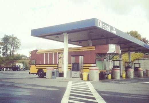 Motorport, a tricked-out school bus, makes a pit stop. 
