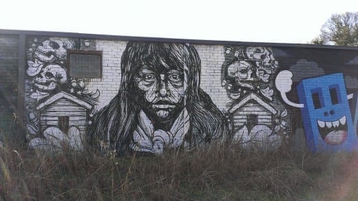 Detail of Living Walls mural Sunride Over Edgewood by Gaia and Nanook, 442 Edgewood Avenue.