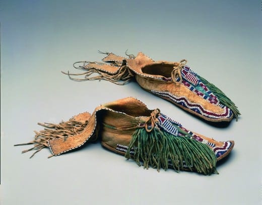 Moccasins, ca. 1870, Numunuu Comanche), Texas or Oklahoma, hide, glass beads, pigment.